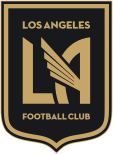 A black shield logo with a gold outline. The shield is flat on the top and sides, and curves to a centered point at the bottom. In the middle is a large gold "LA" in a bold art deco font, with the crossbar of the letter A replaced with a prominent angelic wing made of four lines, angled up and to the left, each line a bit longer than the one below it to create the wing shape. Above and below the "LA" text, it reads "LOS ANGELES" and "FOOTBALL CLUB" respectively in small print (using the same gold color and art deco font).
