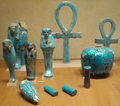 Faience shabti and assorted faience amulets, now in the Metropolitan Museum of Art