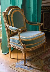 Louis XVI style armchair with a pair of cornucopia, by Georges Jacob, 1765, gilt wood with cushions, Cabinet Doré de la Reine, Palace of Versailles