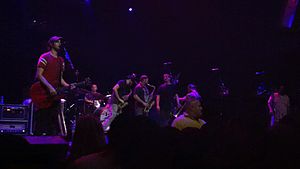 Streetlight Manifesto performing at the Mayan Theatre in 2012. Left to right: Kalnoky, Thatcher, Brown, Conti, Nirenberg, McCullough, and Stewart.