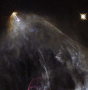 A wider view of the region from the Hubble Space Telescope in visible light shows the Herbig–Haro object HH 150.[17]