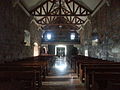 Main door and choir loft, looking down the nave