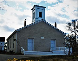 The First Baptist Church, known as the "Old Stone Church"