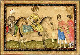 Suleiman is mounted on his horse, wearing gold.