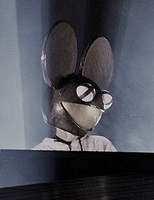 DJ with a mouse head mask performing live
