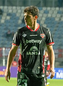 Picture of Santiago Dittborn Martínez-Conde standing in a soccer field.