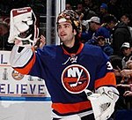 Al Montoyo skating with the Islanders with his goaltender mask off.