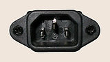 A panel-mounted IEC 60320 C14 male connector jack designed to accept AC line power