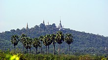 Mountain covered with jungle, and ancient pagodas