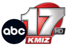 The ABC network logo next to a silver 17 with black trim on a red oval. Beneath the base of the 17 is a red parallelogram with white letters K M I Z. Nestled in the lower right corner near the 7 is a gray parallelogram with silver letters "HD".