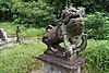 Artist unknown, Statue of guardian lion, located at the gravestones of Ong Sam Leong (d. 1918) and family members, Bukit Brown Cemetery, Singapore.