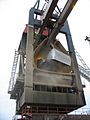 5. The gantry crane moves the cargo to a bin on the pier.