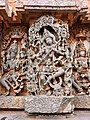 India, ca. 12th century C.E. Hoysaleswara Temple statue of Saraswati playing a stick zither.