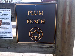 "Plum Beach" sign in Plumb Beach