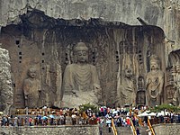 Massive statues at Longmen Grottoes, Henan province, China.