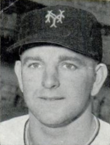 A man in a light baseball jersey and dark cap with an "NY" on the center