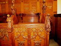 Carving on choir stall. Church of Holy Spirit, Clapham. Photograph courtesy the Rev. Jeremy Blunden.