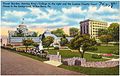 Old postcard of the courthouse and a flower garden