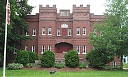 The former armory of Company E of the First Infantry of the Vermont National Guard was built in 1915. It is now low-income housing.[4] (2017)