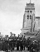 View of the monastery during celebration of Fiesta of El Curpillos. late-19th century.