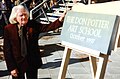 Don Potter with the carved sign at the opening of the Don Potter Art School, Bryanston School, October 1997