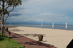 Beach outside the Hyatt Regency Bali looking north towards Mount Agung (concealed by clouds)