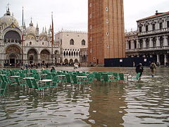 Tidal flooding. Sea-level rise increases flooding in low-lying coastal regions. Shown: Venice, Italy (2004).[264]