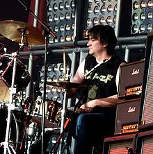 Ed Graham performing with The Darkness at Download Festival, Donington Park, England (10 June 2011)