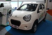 Geely-Kandi Panda EV charging at an autoshow