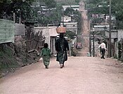A typical street scene in San Pedro Sacatepéquez, Guatemala Department, in 1983 or 1984.