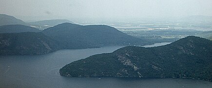 An aerial view of Lake George, with Anthony's Nose and Roger's Rock visible