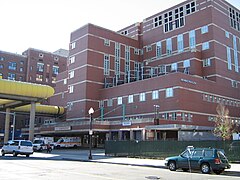 Large, modern red-brick hospital