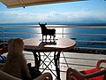 An Osborne bull tabletop decoration on a balcony overlooking Catalonia's Gulf of Roses