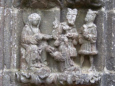 The Adoration of the Magi. One of the reliefs around the porch arch.