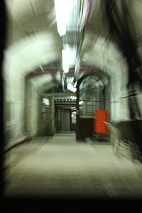 Long basement corridor, Exposure time of 1.3 sec on a 34 mm 18-55 lens