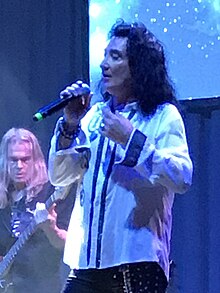 McAuley performing at Raiding the Rock Vault in 2019