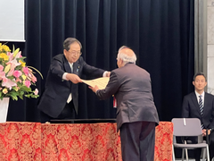 Ryuko Hira being conferred the National Award of Honor by Minister of Land, Infrastructure, Transport and Tourism, Tetsuo Saito in April 2024