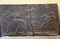 Assyrian chariot, charioteer, and a horse rider. Basalt wall relief. From the palace of Tiglath-pileser III at Hadatu, Syria. 744-727 BCE. Ancient Orient Museum, Istanbul