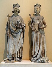 Statues of Charles V and Joanna of Bourbon, probably from the east facade of the Louvre Castle, 14th century, stone with traces of polychrome[25]
