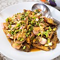 Yam pla salit, a Thai salad made with deep-fried, sun-dried snakeskin gourami