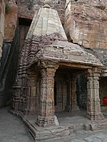 Outer walls of the temple are carved with Hindu deities.