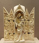 14th-century French ivory triptych showing the Annunciation, Visitation, Nativity with, unusually, Joseph holding the baby, while Mary sleeps; Presentation and Magi.