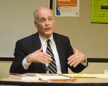 Former Los Angeles Deputy District Attorney Vincent Bugliosi is pictured speaking over a table