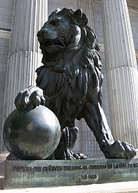 One of the two bronze lions outside the Spanish Congress of Deputies building