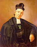 Saint Giuseppe Benedetto Cottolengo wearing the black biretta of a priest in a mid-19th century painting