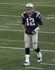 Brady with his hands in a warmer