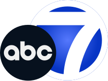 The ABC network logo, a black disk with lowercase letters "abc", overlapping a blue disk trimmed in white featuring a stylized white numeral 7.