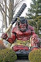 A statue of an oni armed with a kanabō