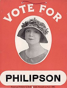 A red placard with a monochrome head-and-shoulders photo of Philipson