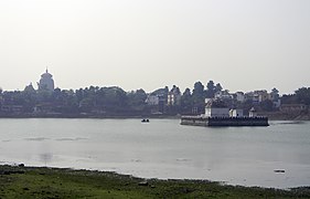 Image of Bindusagar pond with Lingaraja temple in the background.